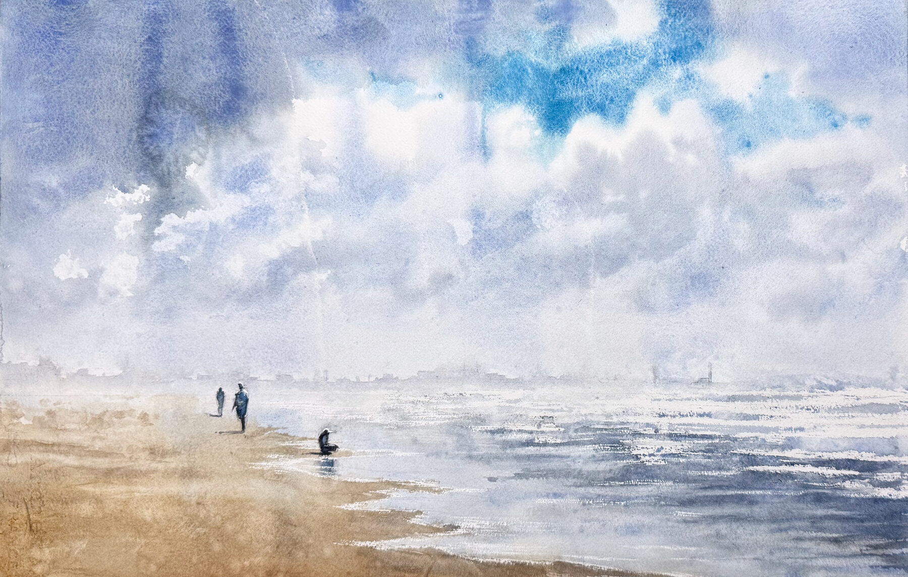 Strand i Pietrasanta med ljus sand, hav och sommarljus.